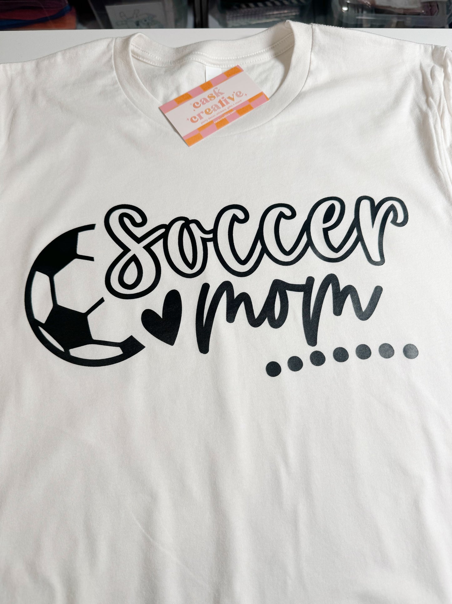 Vintage White Adult T-shirt: Soccer Mom